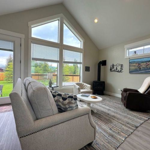 Kick back and relax in the living room, taking advantage of the cozy seating and gas fireplace.