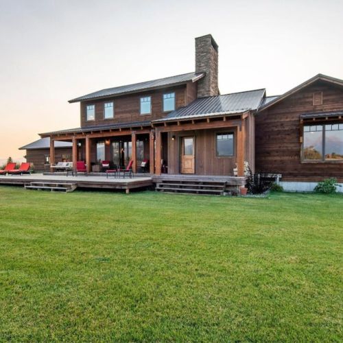 The expansive back deck is the perfect hangout spot to enjoy a little fresh air and unmatched views of the Tetons.