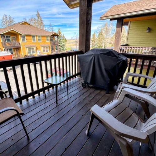 The second-floor balcony off the living room comes with a gas grill.