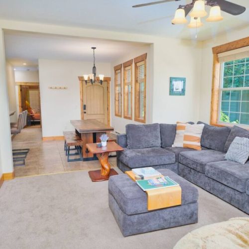 Whether you are cooking in the kitchen, eating at the dining table, or lounging in the living room, the open layout means you can always be a part of the fun in this condo.