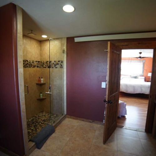 En suite master bath with a soaking tub and shower.