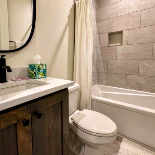 Bedroom #5's en suite has a tub/shower combo.