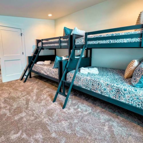 Bedroom #4 has two twin-over-full bunk beds — perfect for kids!