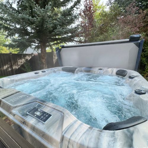There is no better way to unwind after a day of play than a dip in the brand-new hot tub, located in the backyard.