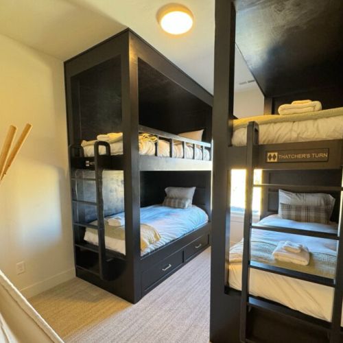 Bedroom #4 has two built-in twin-over-twin bunk beds — perfect for kids!