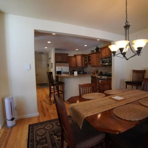 Dining room is off the kitchen to keep everyone together.