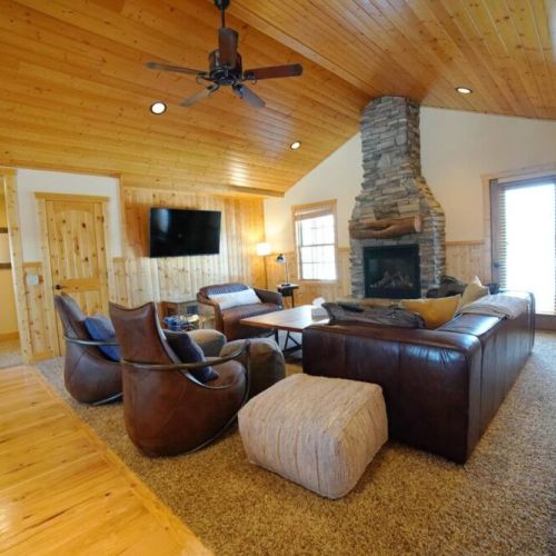 The spacious living room connects with the dining room and kitchen, making it an ideal space for spending time with friends and family.