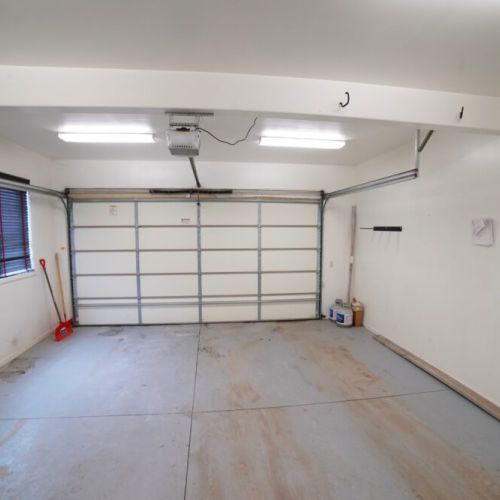 The 2-car garage keeps your vehicles free from the elements, and is the perfect place to store any gear.
