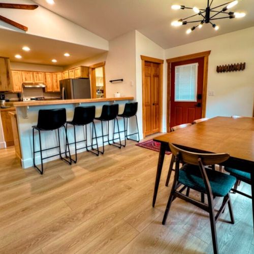The home's open layout ensures that no one is ever left out of the fun.