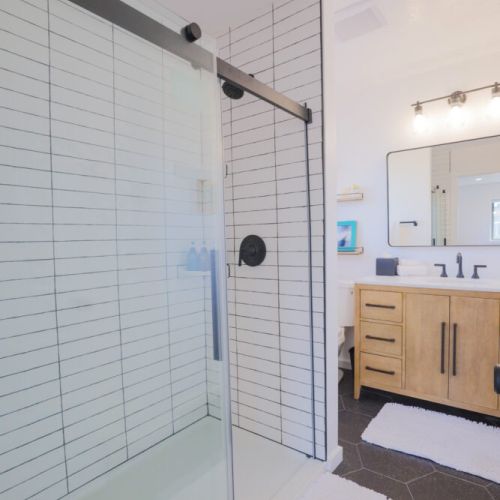 The master en suite bathroom enjoys a walk-in shower and a spacious vanity.