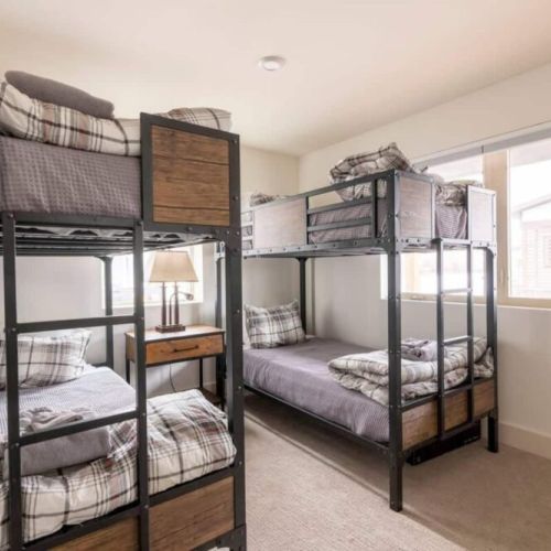 Bedroom #2 has two twin-over-twin bunk beds, made in an attractive mountain modern style.
