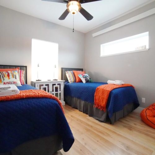 Bedroom #3 has two twin beds, as well as lots of board games — perfect for kids!