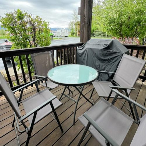 Take in a meal or your morning coffee out on the living room porch, where you will also find a propane BBQ!
