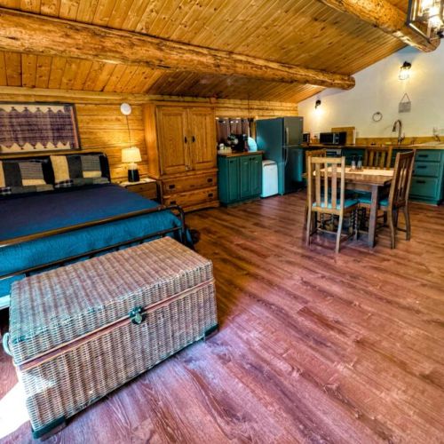 The loft apartment has a queen bed, as well as a twin day bed with a trundle.