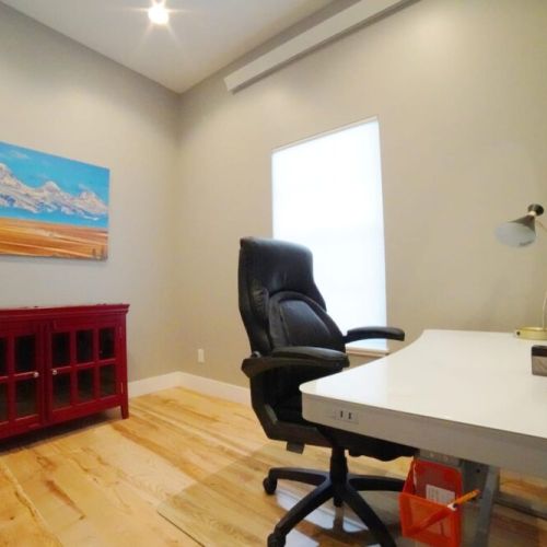 Need to work- or school-from-home? We've got you covered with this quiet study, complete with a sit-stand desk.