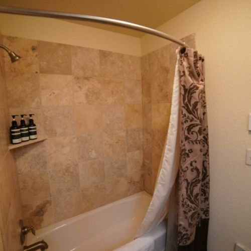 Combo tiled shower and tub.