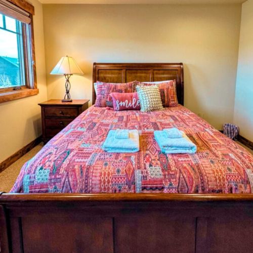 Bedroom #3 has a queen bed, as well as a large closet and drawers.