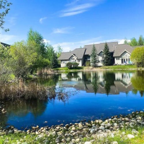Enjoy a gorgeous view behind the townhome — the pond looks great in all seasons!