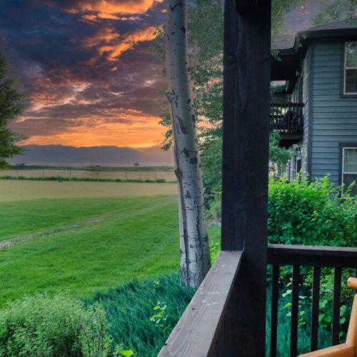 On the porch off of Bedrooms #2 and #3, take in breathtaking views of the Big Hole Mountains in the west.