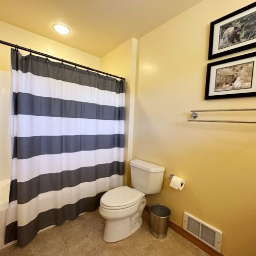 Bedroom #2's en suite has a double vanity and a large tub/shower combo.