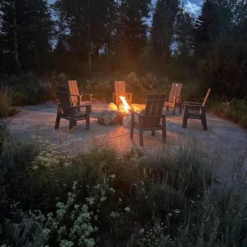 The outdoor fire pit offers a cozy, relaxing option for unwinding.