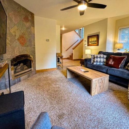 Kick back and relax in the living room, taking advantage of the cozy seating and a large TV.
