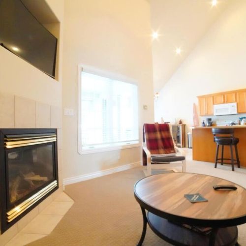 Whether you are sitting down to relax in the living room, hanging out in the kitchen, or having a snack at the dining room table, you can always be a part of the fun in this house.