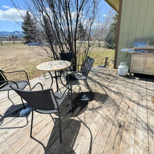 Head to the back porch to enjoy your morning coffee or a meal prepared on the propane grill.