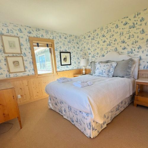 Bedroom #3 has a queen bed, lots of storage, and its own beautiful view of the mountains.