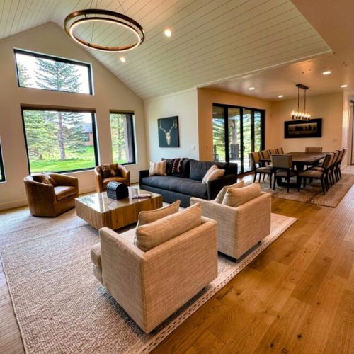 Kick back and relax in the living room, taking advantage of the inviting seating, a large smart TV, and a cozy gas fireplace.