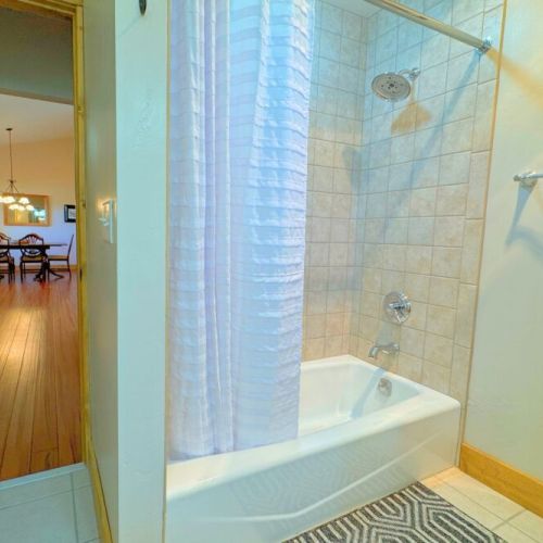Bedrooms #2 and #3 share a full bathroom, complete with a double vanity and tub/shower combo.