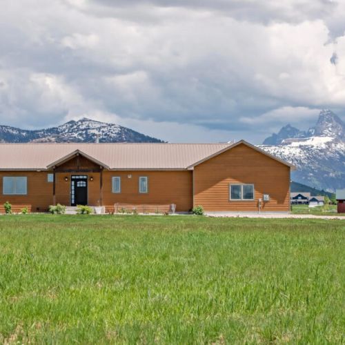 Take in beautiful, unobstructed views of the Tetons from the comfort of this well-appointed family home.