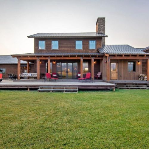 The expansive back deck is the perfect hangout spot to enjoy a little fresh air and unmatched views of the Tetons.