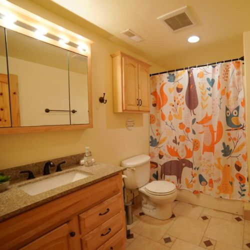 Bedrooms #4 and #5 share a bathroom with a large tub/shower.