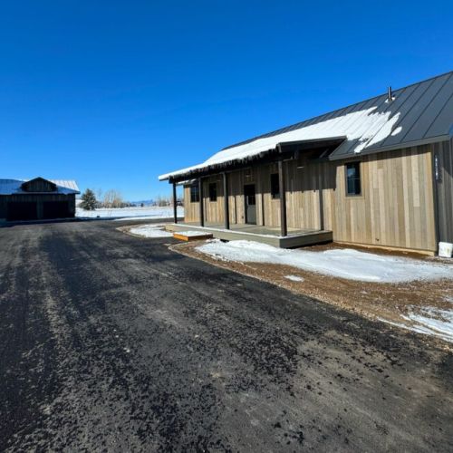 The guest house is on the same property as another, occupied home.