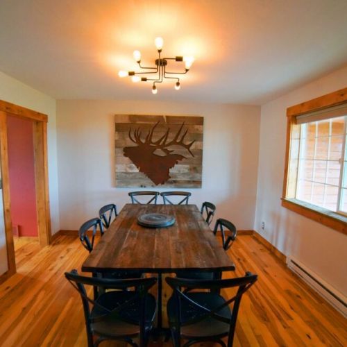 How great is this formal dining room - table sits 8-10 with room for more at the kitchen table.
