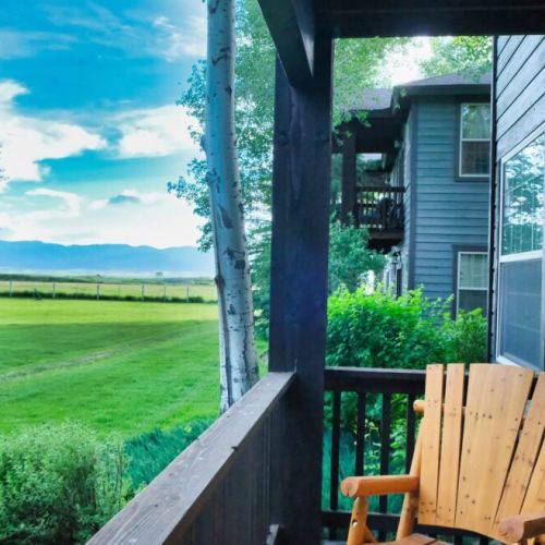 On the porch off of Bedrooms #2 and #3, take in breathtaking views of the Big Hole Mountains in the west.