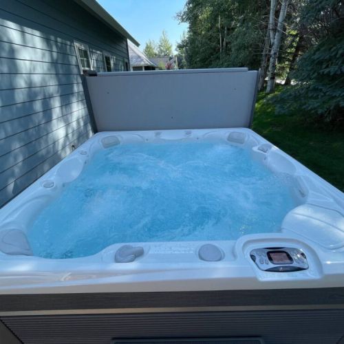 Take a dip in the hot tub after a day of play!
