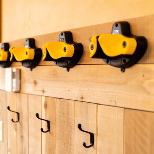 Make use of the rubberized hooks right by the front door — perfect for storing your skis or other gear!