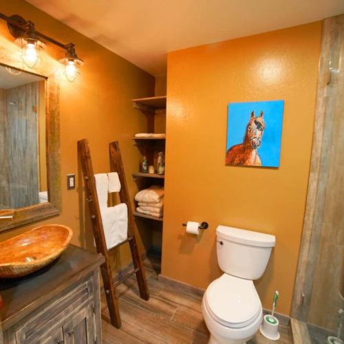 Basement bath with tiled shower.