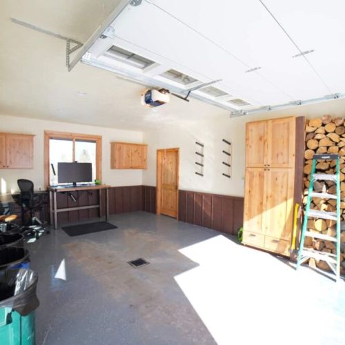Need to get some work done but want to get away from the rest of the house? The dedicated workspace out in the garage is the perfect retreat.