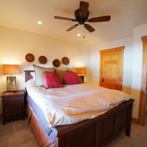 Bedroom #4 is also located in the basement and features a queen bed.