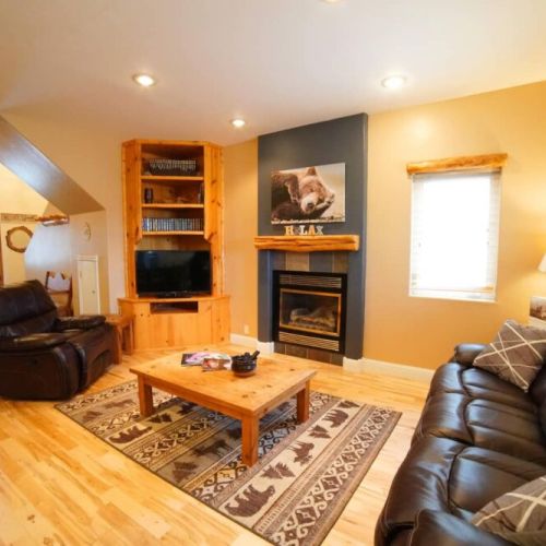 Kickback at the end of a day of skiing, hiking, or biking by relaxing in the cozy living room.