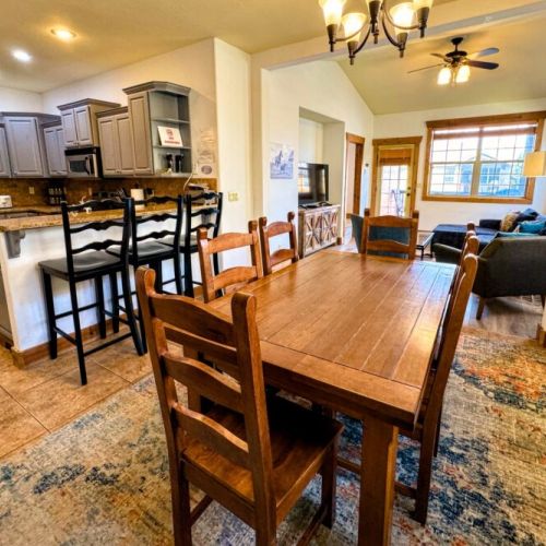 Sit down at the dining room table for food, games, or conversation!