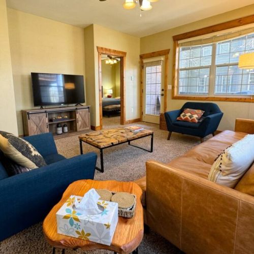 Kick back and relax on the cozy furniture while streaming your favorite programs on the smart TV.