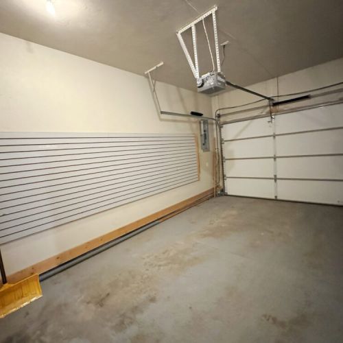 Keep your gear dry and store your vehicle in this one-car garage!