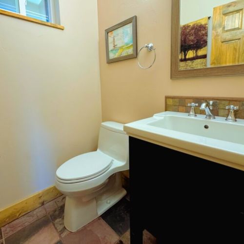 There is a powder room conveniently located off the main living area.