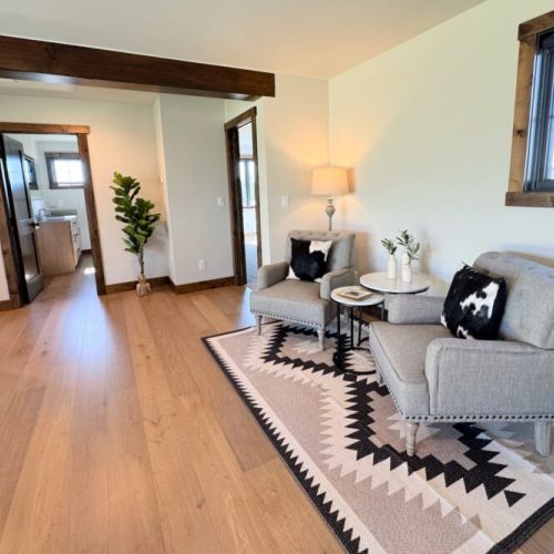 Upstairs, you'll find a cozy seating area conveniently located between the bedrooms.
