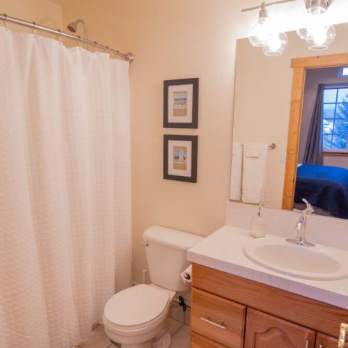 The master en suite has a convenient vanity and a tub/shower combo.