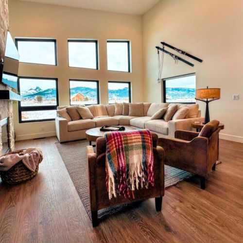 Kick back and relax in the living room, taking advantage of the inviting seating, a large TV, and a cozy gas fireplace.